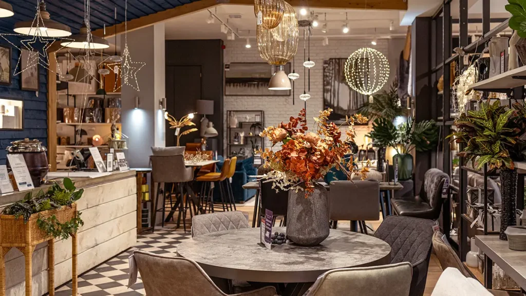 Interior of Woods Furniture at Brewery Square, Dorchester showing dining furniture and lighting.