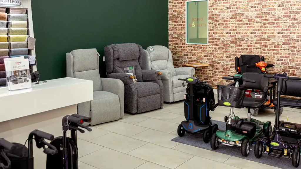 Interior of Rapid Mobility Dorchester showroom with mobility scooters and customer service desk