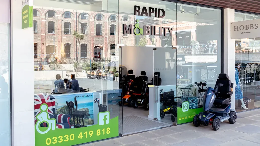 Wide view of Rapid Mobility Dorchester showroom showing scooters and powered mobility vehicles